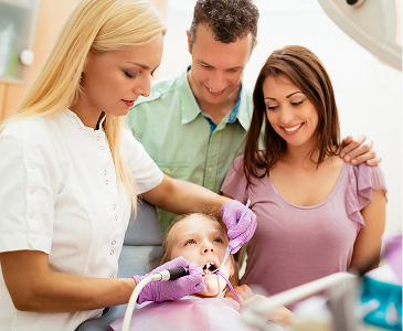 Pediatric Dental Checkup with Parents Present