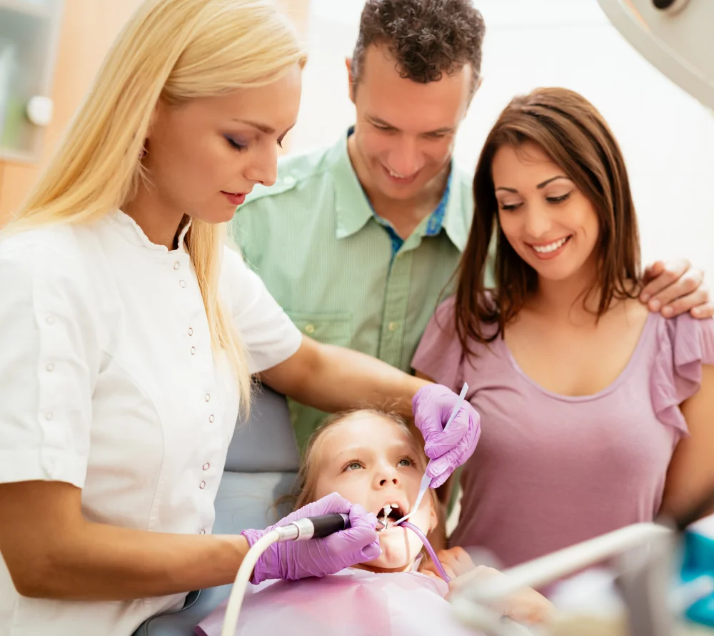 Pediatric Dental Checkup with Parents Present